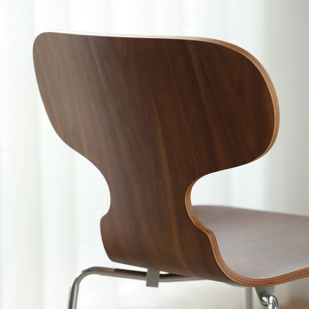 Wooden chair with a modern design on a white background