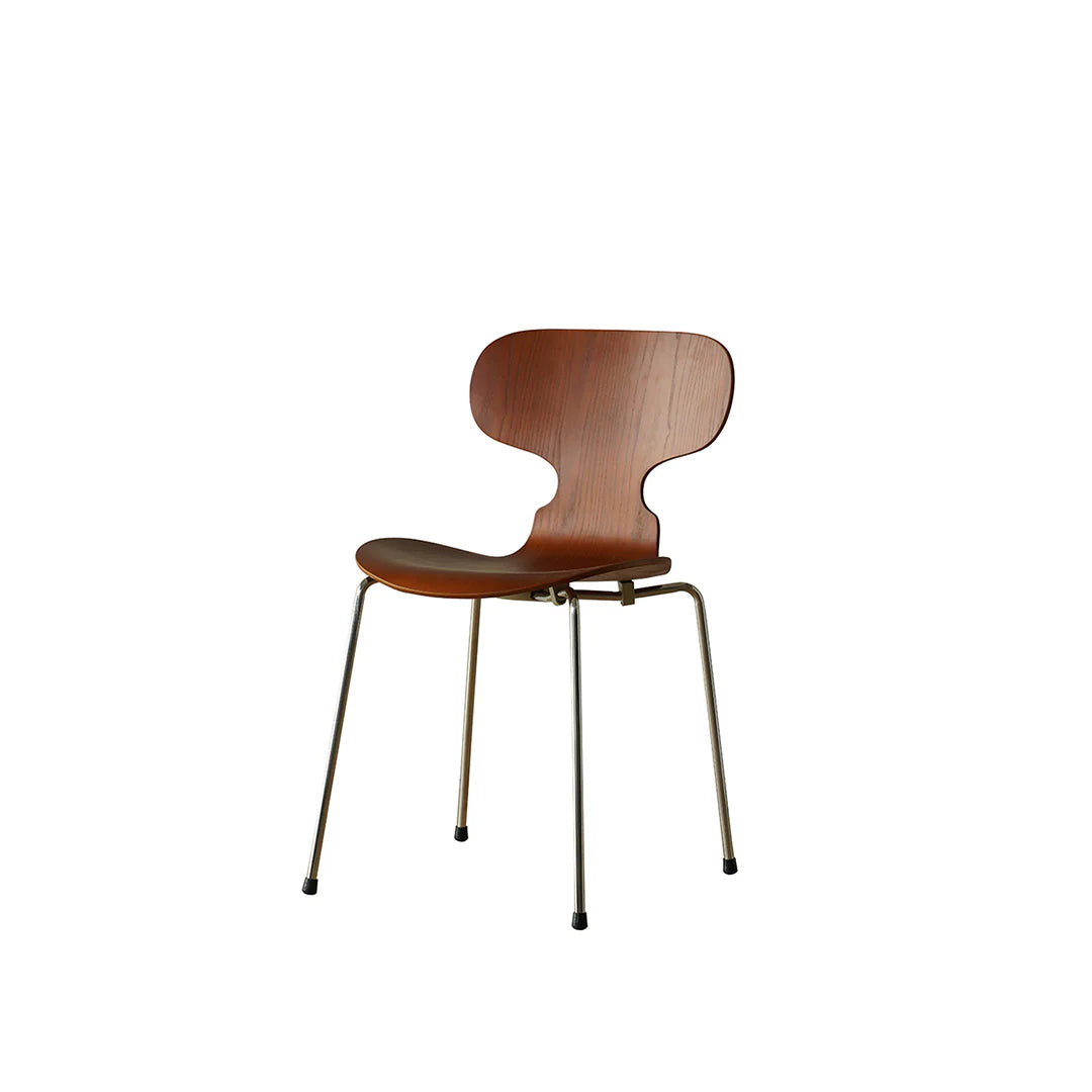 Wooden chair with metal legs on a white background