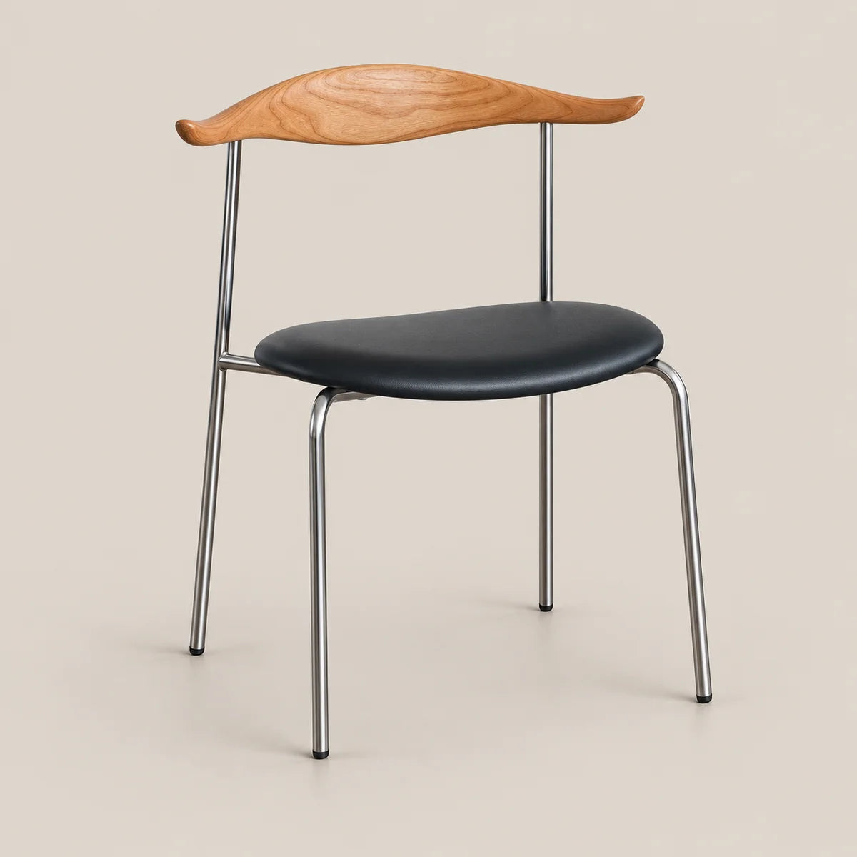 A modern dining chair with a curved natural wood backrest, a black upholstered seat, and a slim chrome metal frame, shown against a solid beige background.