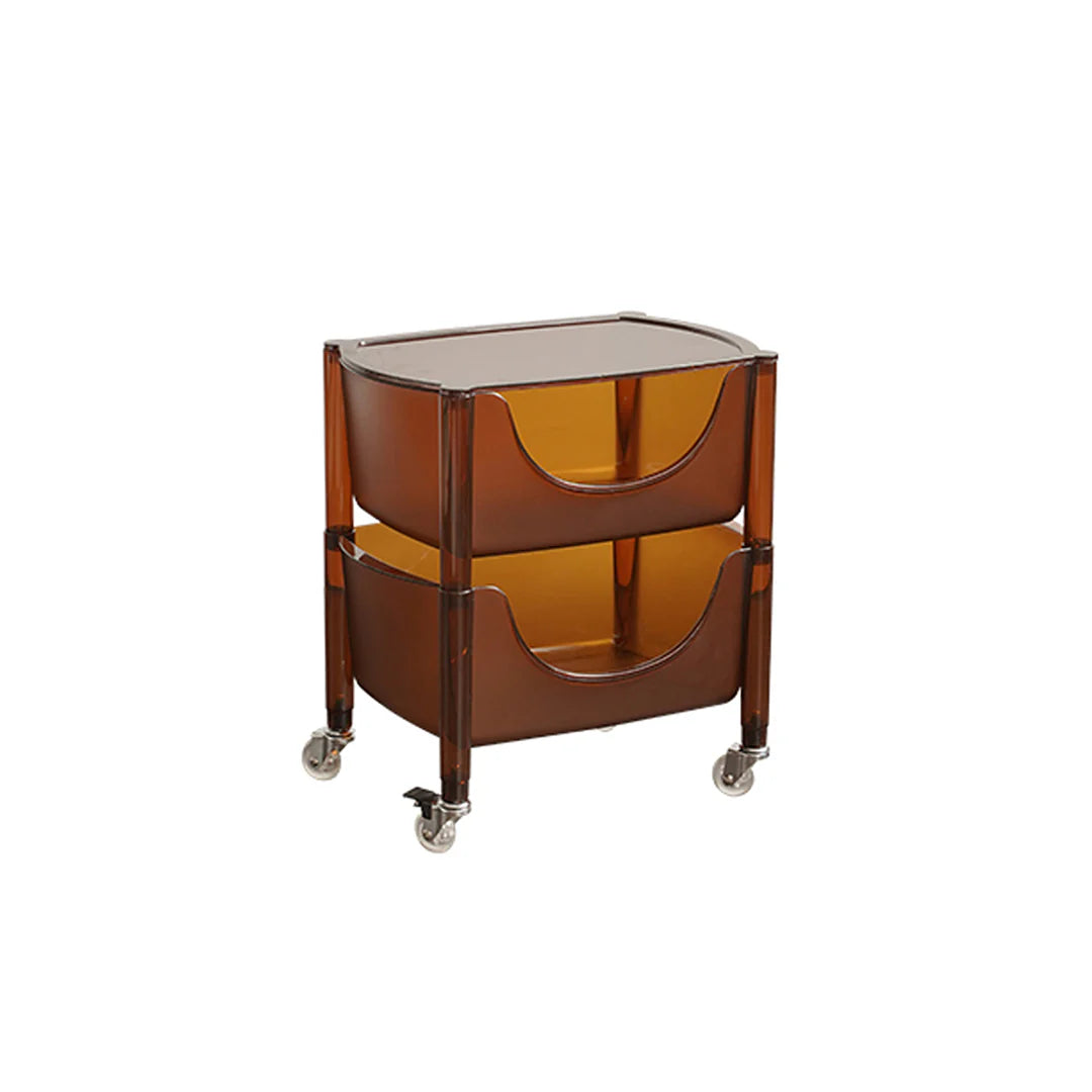 Two-tiered serving cart with amber glass shelves on a white background