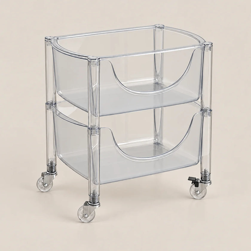 A two-tier clear plastic rolling storage cart with a semi-circular basket design on each level, supported by clear acrylic side rails and four caster wheels, shown against a solid light beige background.