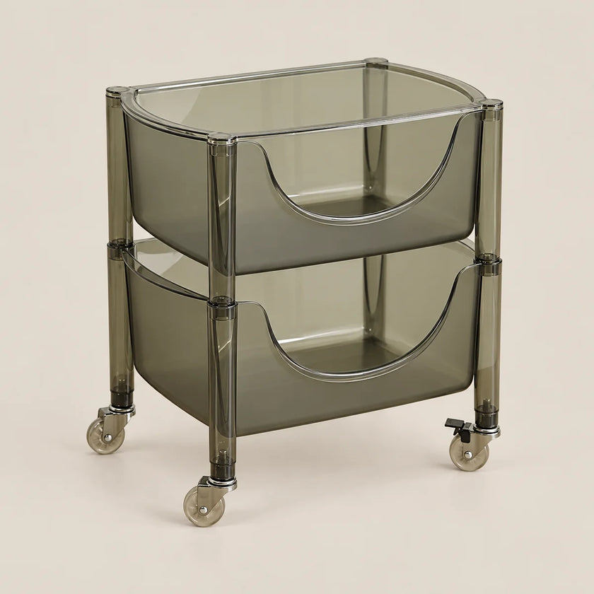 A two-tier rolling storage cart with translucent smoky gray plastic bins and a matching frame, fitted with small caster wheels, shown on a plain light beige studio background.