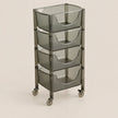 A four-tier rolling storage cart with translucent smoky gray plastic bins and a dark gray metal frame on casters, shown on a solid light beige background.