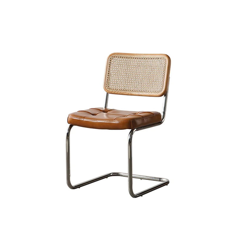 Brown chair with woven backrest on a white background