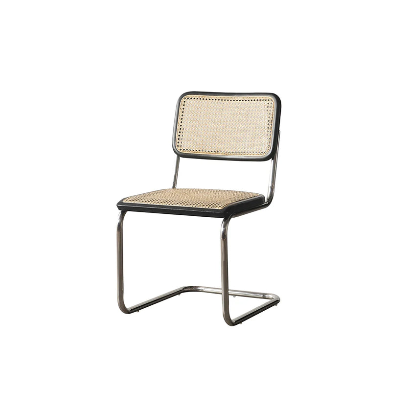 Chair with metal frame and woven seat on a white background