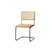 Chair with woven seat and backrest on a white background
