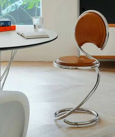 Modern brown stool with metal base in a minimalistic room