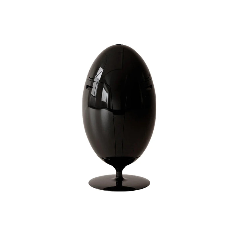 Black egg-shaped speaker on a white background