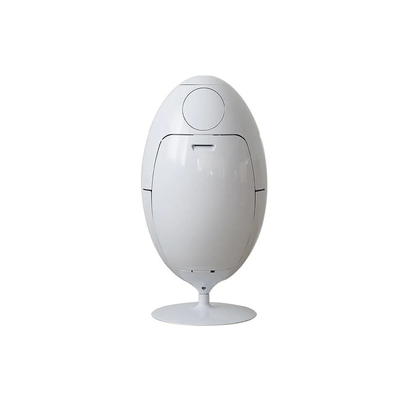 White egg-shaped device on a white background