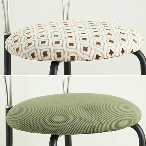 Two chair seat covers with different patterns and colors on a white background.