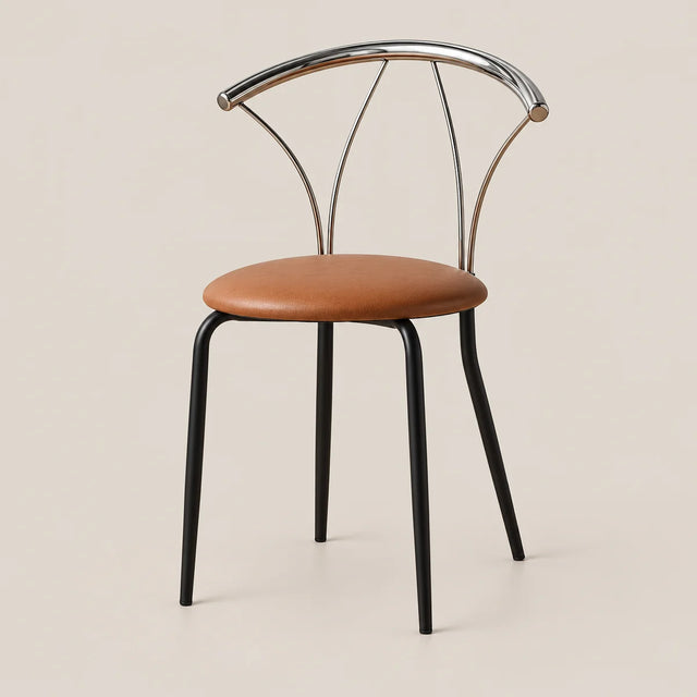 A modern dining chair with a curved backrest made of polished silver metal, a brown leather seat cushion, and slim black metal legs, shown against a solid light beige background.