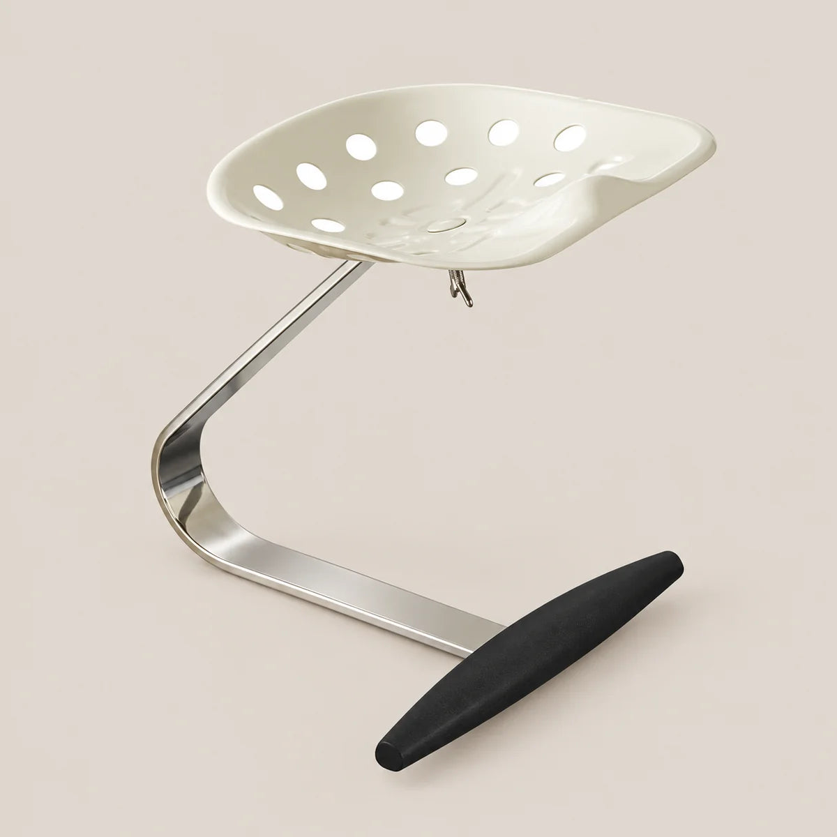 A modern ergonomic office chair with a white perforated seat, a curved chrome metal base, and a black footrest, shown on a solid beige background.