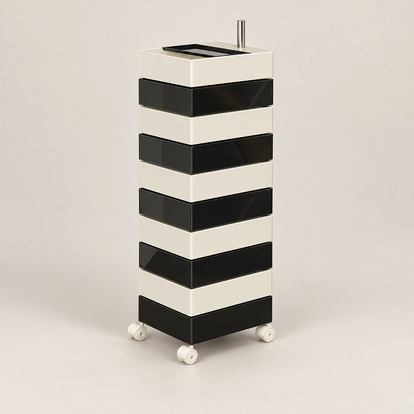 A modern black and white striped rolling storage cabinet with a top tray and small metal handle, shown on a neutral light gray background.