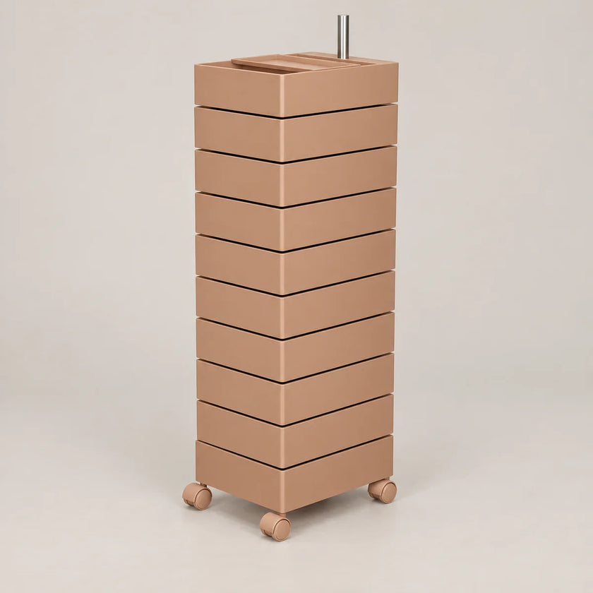 A modern, minimalist rolling storage cabinet with ten stacked rectangular drawers in a warm taupe-brown finish, featuring a built-in top tray and dual metal handles, set against a solid light beige background.