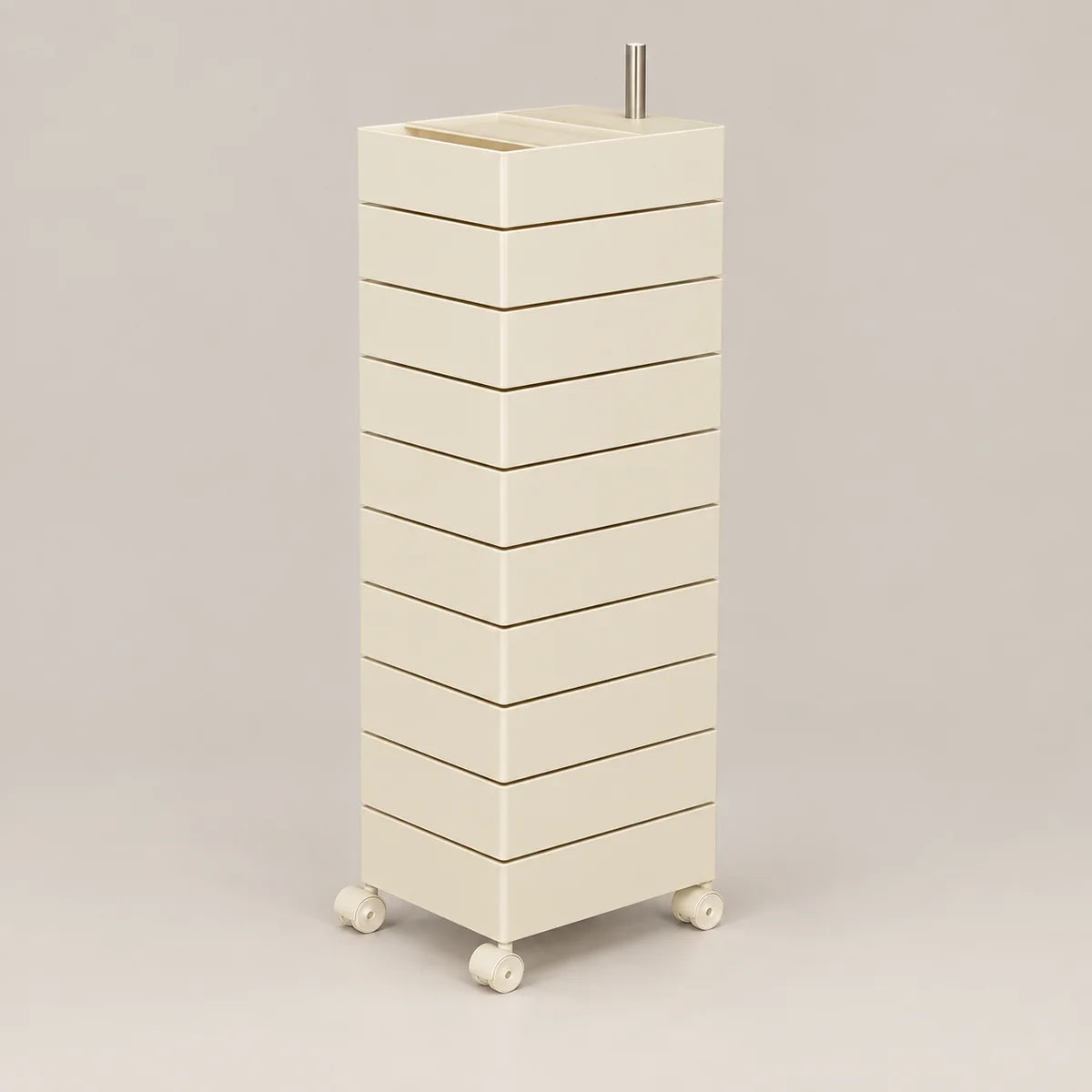A tall, cream-colored rolling storage cabinet with multiple stacked drawers and a metal handle on top, set against a solid light gray background.