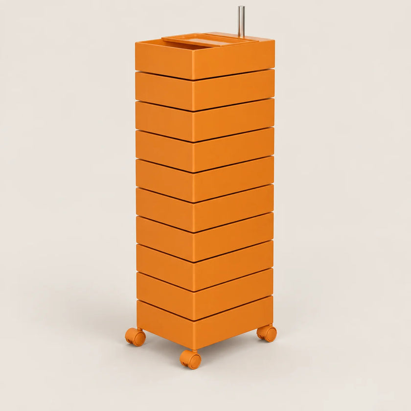 An orange modular storage cart with nine stacked drawers and four caster wheels, featuring a metal handle on top, shown against a light beige background.