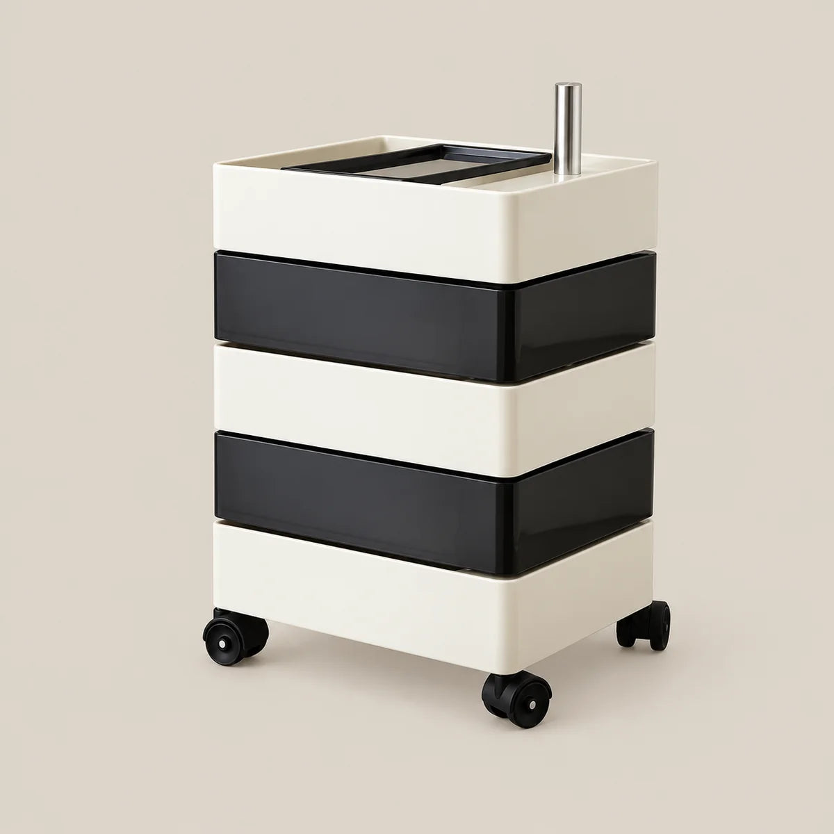 A modern rolling storage cart with three black drawers on a cream-colored frame, featuring a top tray and a silver metal handle, set against a solid beige background.
