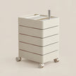 A cream-colored rolling organizer cart with four stacked drawers, four caster wheels, and a silver metal handle on a solid beige background.