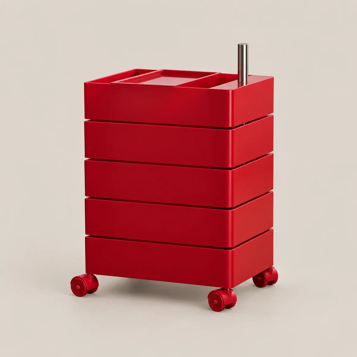 A bright red rolling storage cart with five stacked drawers, a top tray, a vertical metal handle, and small caster wheels, shown on a plain warm light gray studio background.