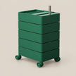 A green rolling storage cart with five stacked drawers and a metal handle, shown on a plain beige background.