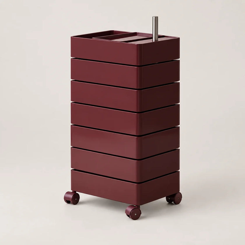 A dark burgundy rolling storage cart with six stacked drawers, a top tray, and a silver metal handle, shown on a light gray background.