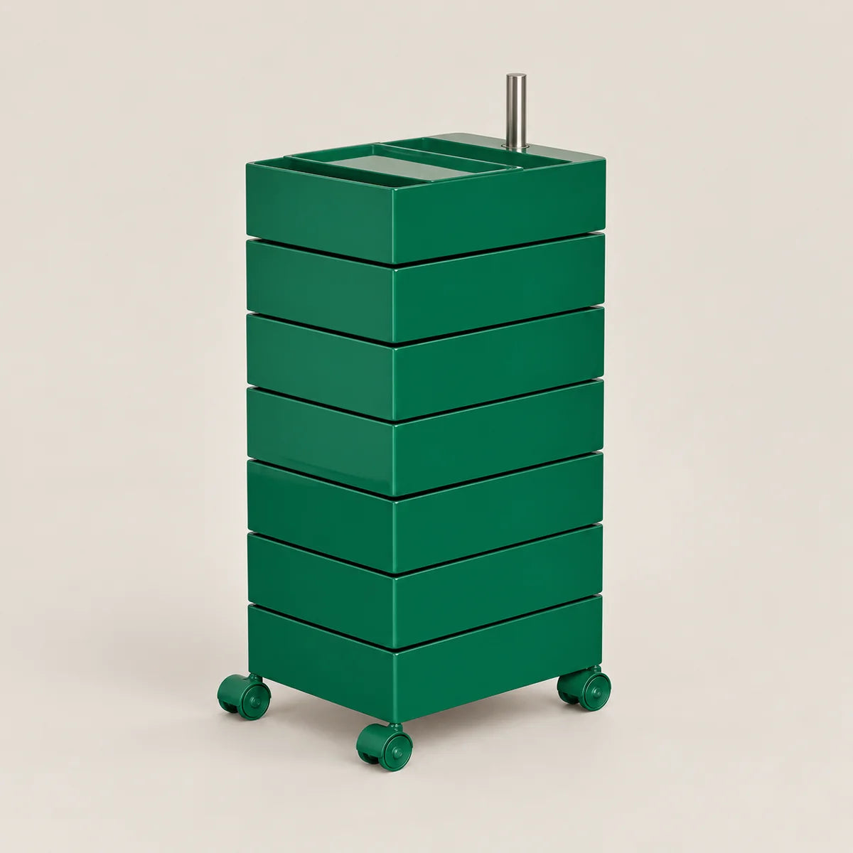 A green rolling storage cart with six stacked drawers and a metal handle on top, shown on a plain beige studio background.
