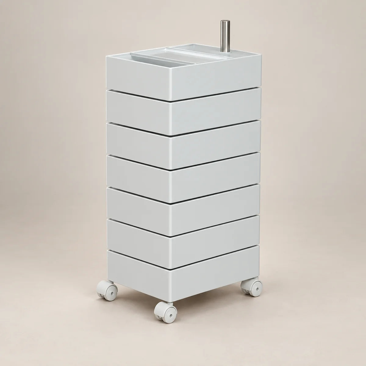 A white rolling storage cart with six stacked drawers, a top tray, and caster wheels, shown on a plain beige studio background.