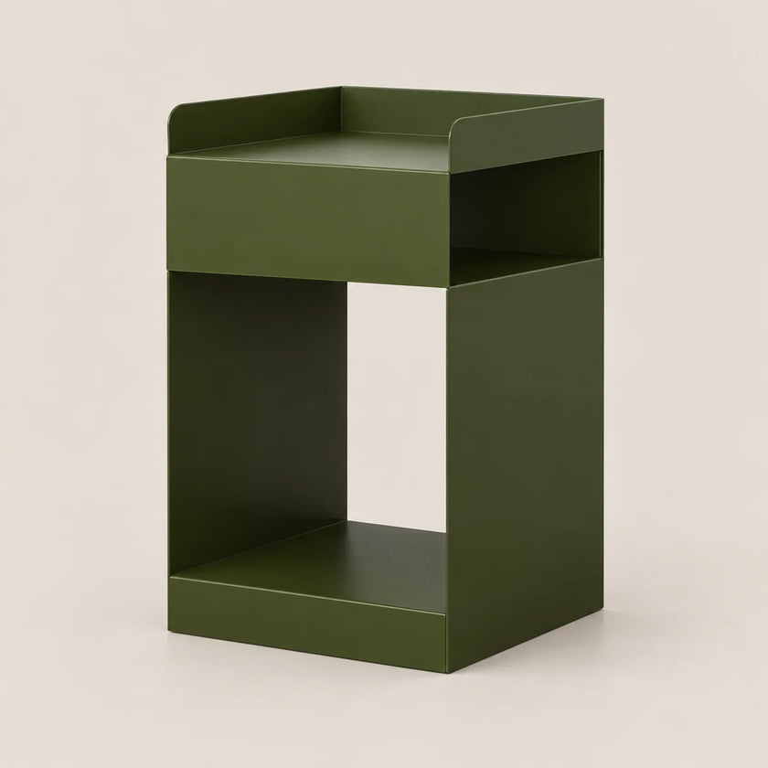 An olive green metal side table with a minimalist open design, featuring a top tray, a central open shelf, and a bottom shelf, set against a solid light beige background.