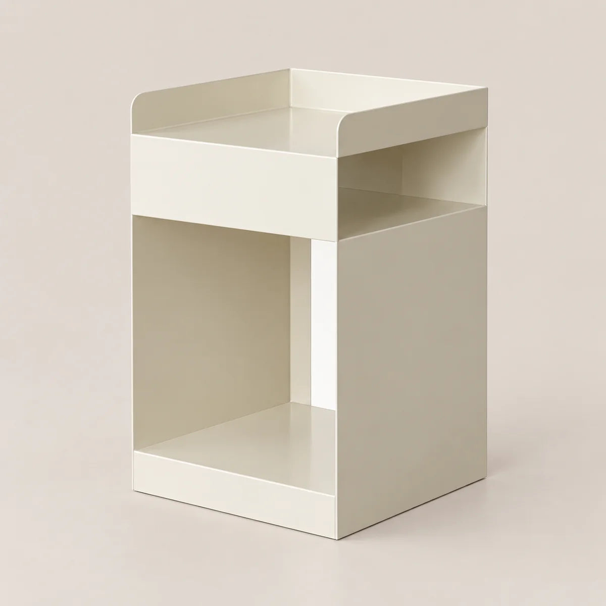 A minimalist, modern side table or organizer with a cream-colored finish, featuring a top tray, a middle open shelf, and a lower base shelf, set against a solid light beige background.