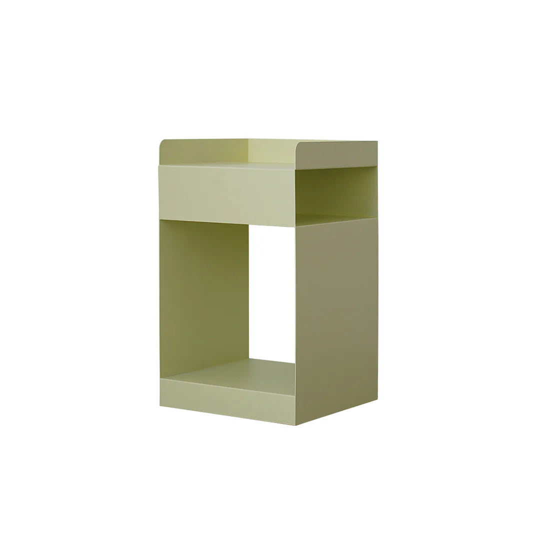 Green side table on a white background