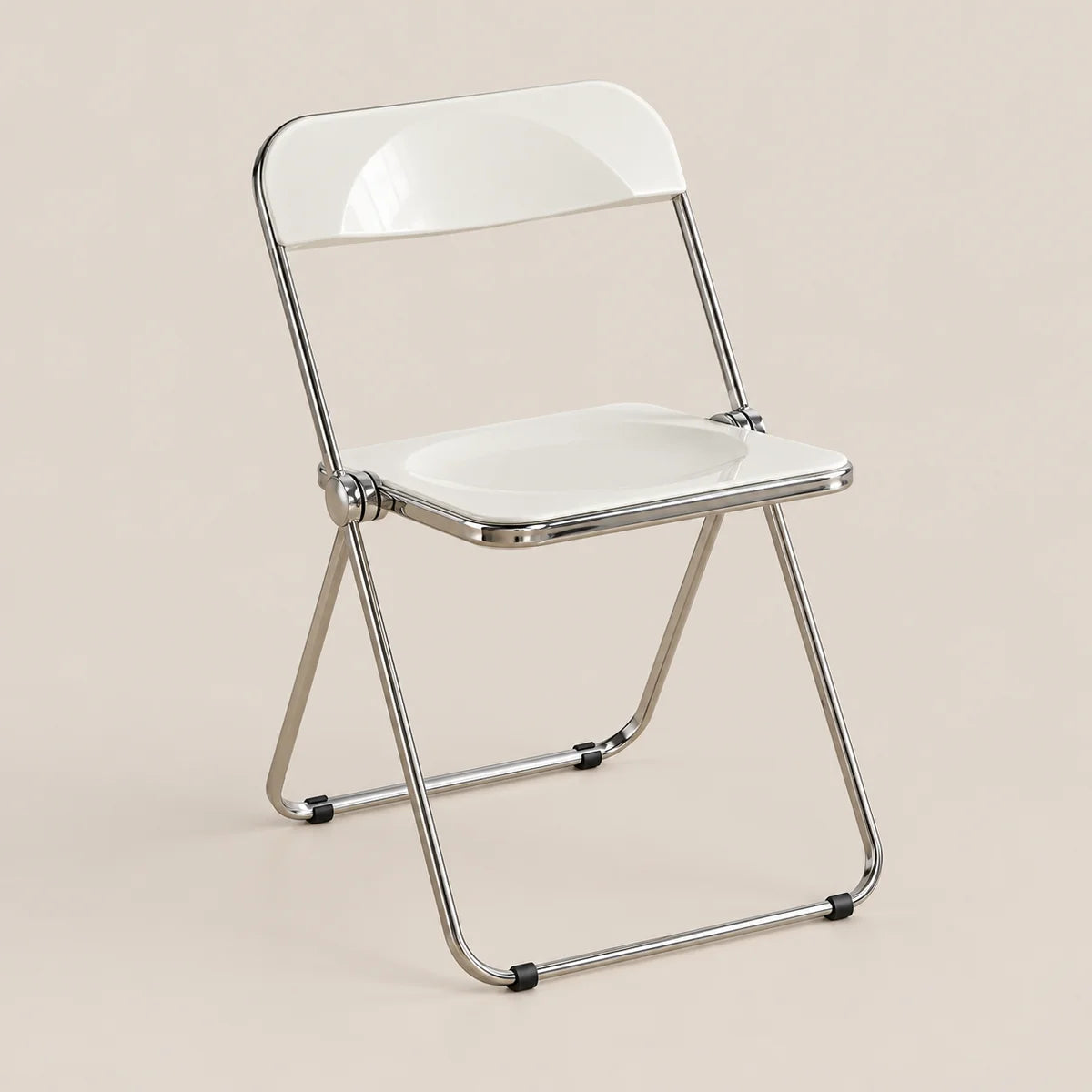 A modern folding chair with a glossy white seat and backrest, supported by a slim metallic silver frame, set against a solid light beige background.