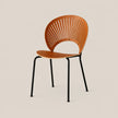 A modern slatted wooden chair with a warm orange-brown seat and backrest, supported by black metal legs, shown against a solid light beige background.