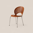 A mid-century modern side chair with a curved, slatted brown wooden backrest and seat, supported by slim chrome legs, set against a solid light beige background.