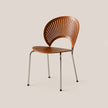 A modern slatted wooden dining chair with a curved backrest and seat, supported by slim chrome legs, shown against a solid light beige background.