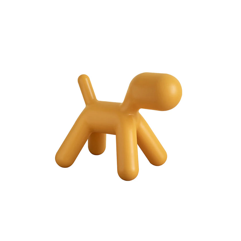 Yellow dog-shaped chair on a white background