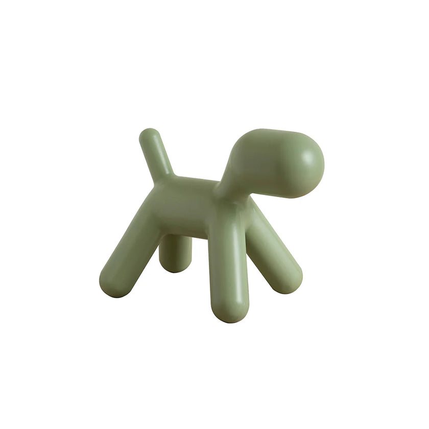 Green dog-shaped object on a white background