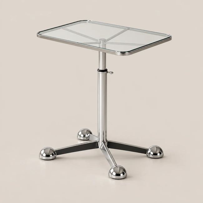 A modern square side table with a clear glass top, chrome metal pedestal base, and four spherical chrome feet, shown on a solid beige background.