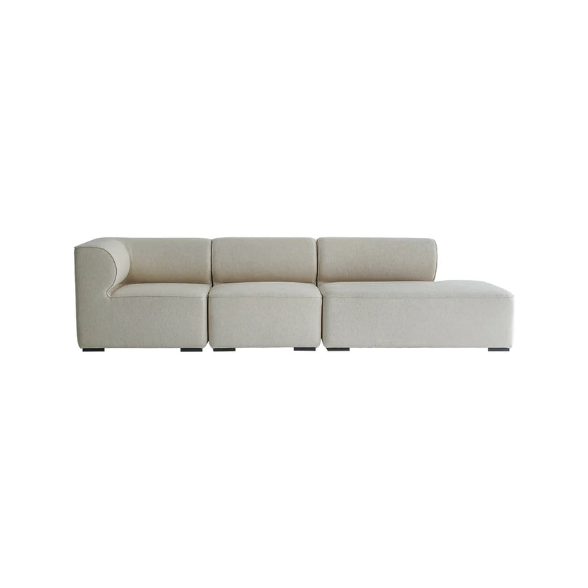 Beige sectional sofa on a white background