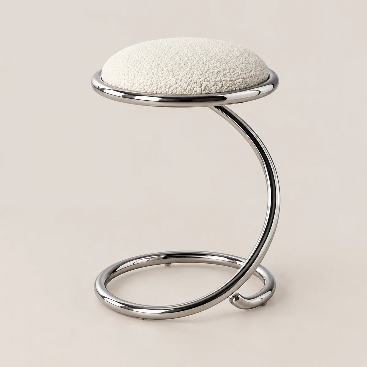 A modern stool with a textured off-white circular seat cushion and a curved, polished chrome metal base, set against a solid light beige background.