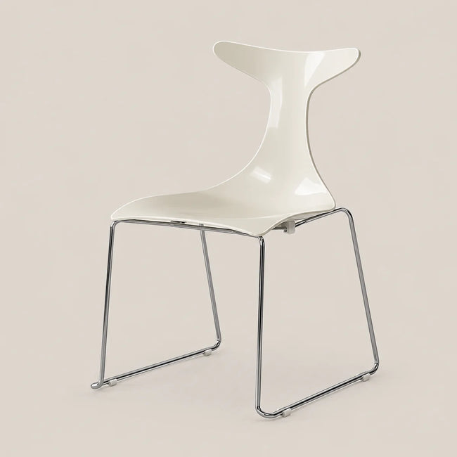 A modern white molded plastic chair with a curved, sculptural backrest and slim chrome wire legs, shown against a solid light beige background.