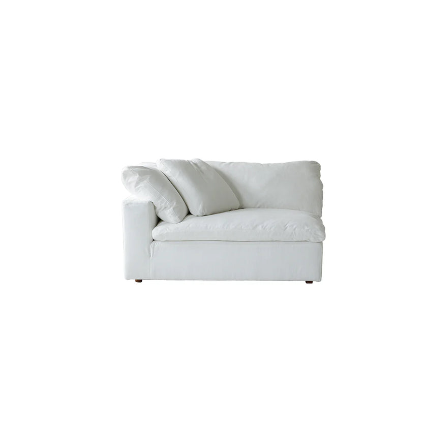 White sofa with cushions on a white background