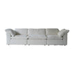 Light gray sectional sofa on a white background