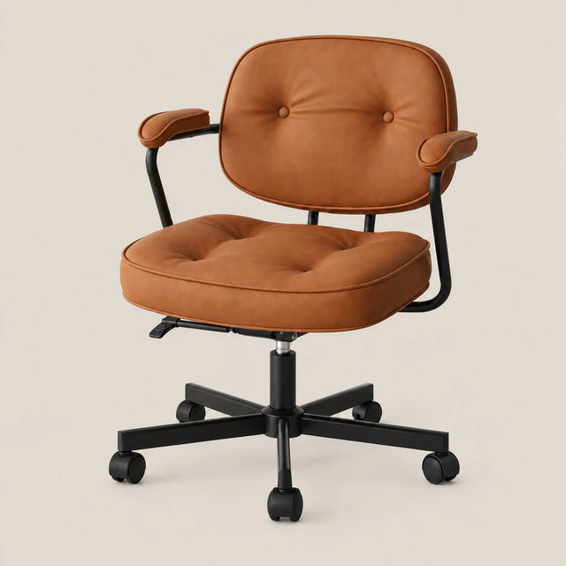 A modern office chair with a tufted cognac brown upholstered seat and backrest, supported by a black metal five-star base with casters, set against a solid light beige background.
