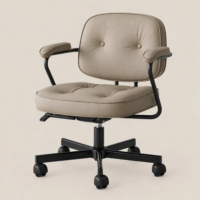 A modern office chair with a tufted beige upholstered seat and backrest, supported by a black metal five-star base with casters, set against a solid light beige background.