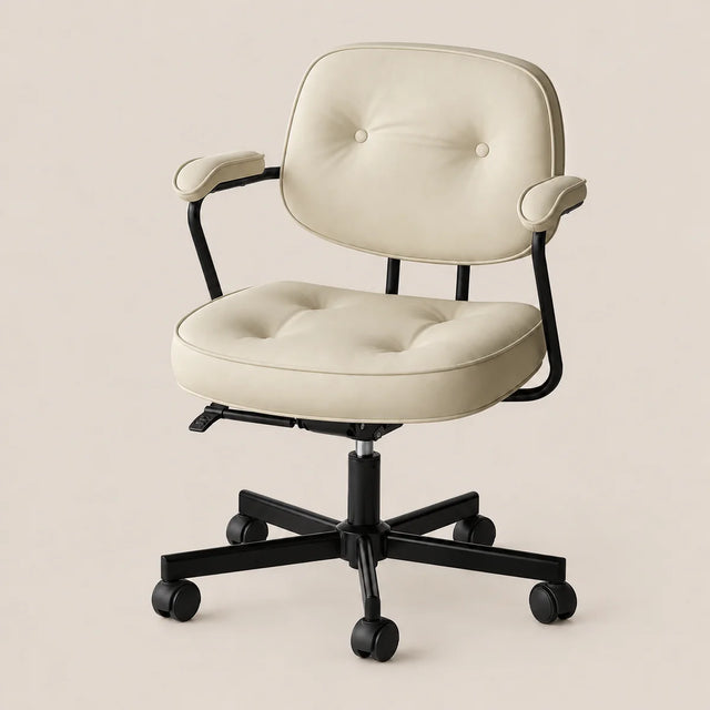 A modern office chair with cream tufted faux leather upholstery and a black five-star wheeled base, shown against a solid light beige background.
