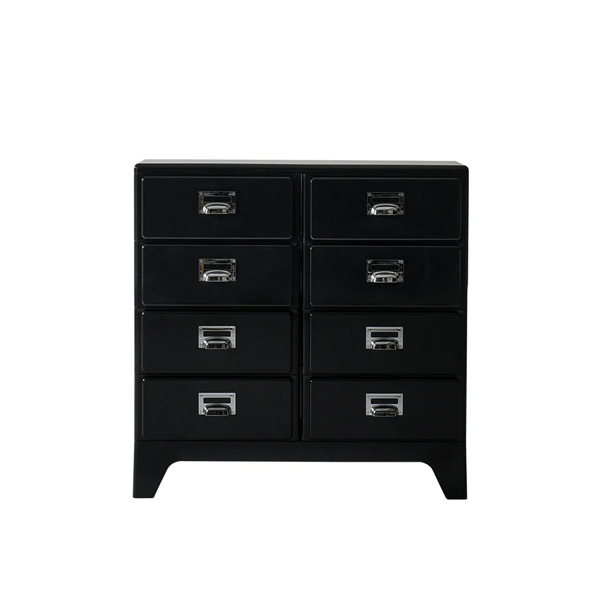 Black dresser with multiple drawers on a white background