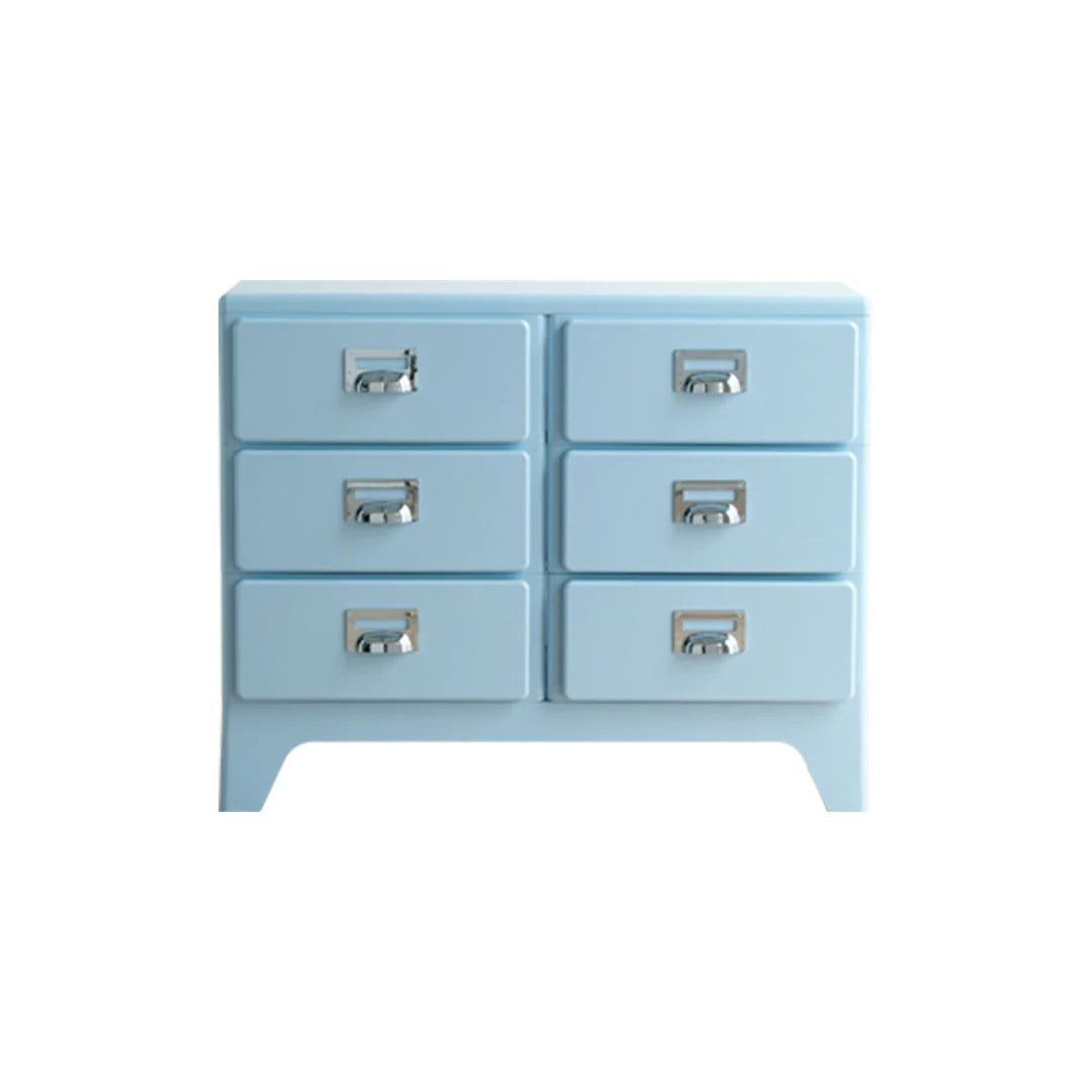 Light blue dresser with six drawers on a white background