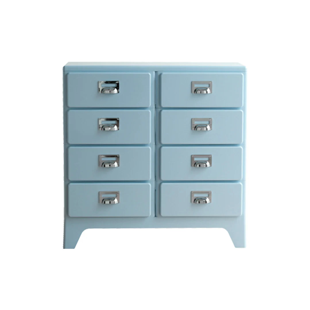 Light blue dresser with silver handles on a white background