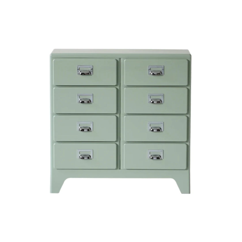 Light green dresser with multiple drawers on a white background