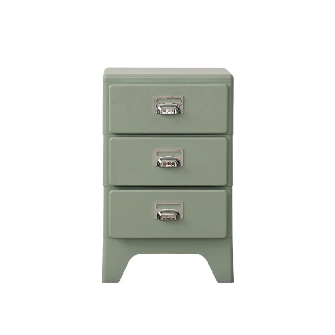 Green nightstand with three drawers on a white background